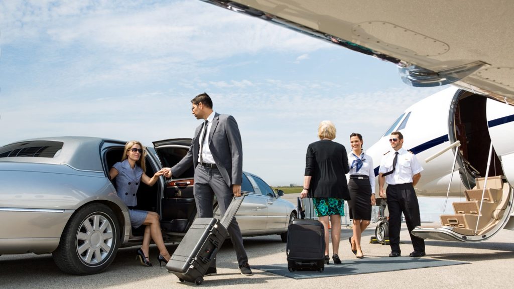 business couple catching a taxi